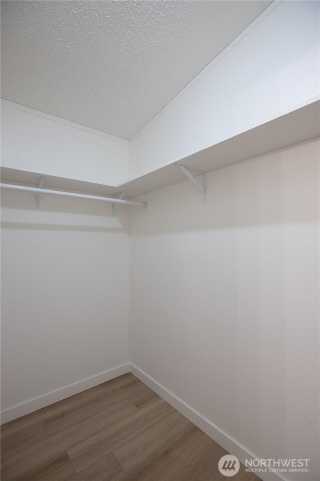 36715 Allen Rd S, Roy, WA 98580 - spacious closet featuring wood finished floors