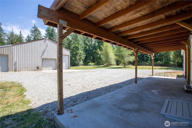 36715 Allen Rd S, Roy, WA 98580 - view of patio / terrace with a detached garage and an outdoor structure