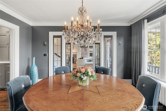 1631 Interlaken Pl E, Seattle, WA 98112 - dining area featuring a chandelier and crown molding