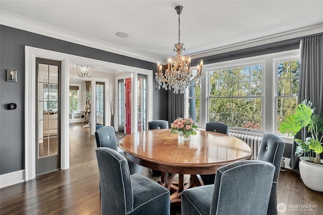 1631 Interlaken Pl E, Seattle, WA 98112 - dining room featuring a chandelier, ornamental molding, dark wood-style flooring, and radiator