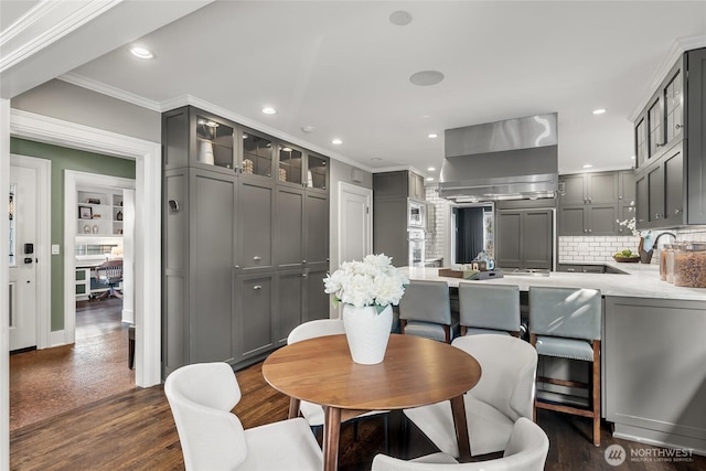 1631 Interlaken Pl E, Seattle, WA 98112 - dining room with crown molding, dark wood-style floors, and recessed lighting