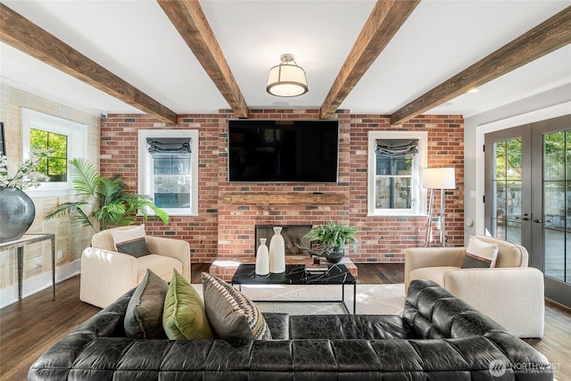 1631 Interlaken Pl E, Seattle, WA 98112 - living area featuring healthy amount of natural light, wood finished floors, brick wall, and beam ceiling