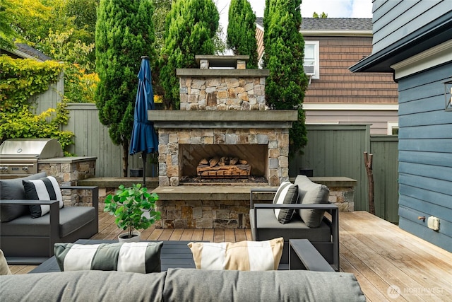 1631 Interlaken Pl E, Seattle, WA 98112 - view of patio / terrace with a deck, an outdoor living space with a fireplace, and an outdoor kitchen