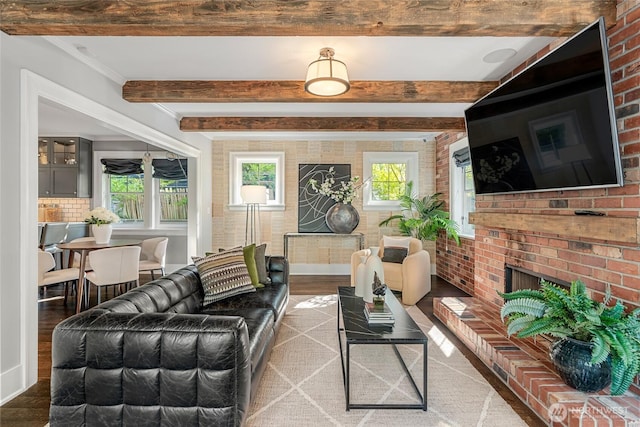 1631 Interlaken Pl E, Seattle, WA 98112 - living area featuring wood finished floors, beam ceiling, and brick wall
