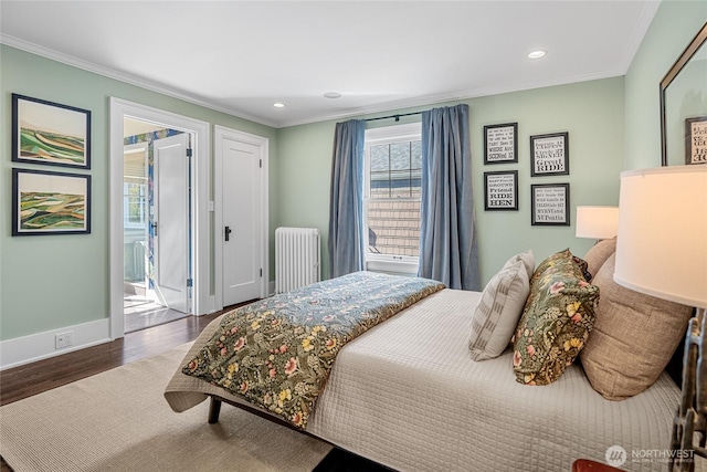 1631 Interlaken Pl E, Seattle, WA 98112 - bedroom with radiator, crown molding, wood finished floors, recessed lighting, and connected bathroom