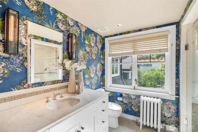 1631 Interlaken Pl E, Seattle, WA 98112 - full bathroom featuring radiator, wallpapered walls, vanity, tile patterned floors, and a shower