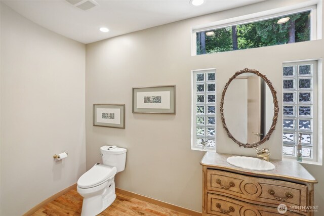 1706 205th Pl NE, Sammamish, WA 98074 - bathroom with vanity, wood finished floors, and recessed lighting