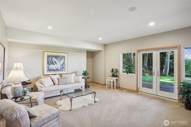 1706 205th Pl NE, Sammamish, WA 98074 - living room featuring carpet flooring, french doors, and recessed lighting