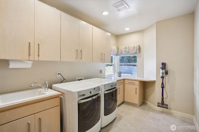 1706 205th Pl NE, Sammamish, WA 98074 - laundry room with independent washer and dryer, cabinet space, recessed lighting, and light tile patterned floors