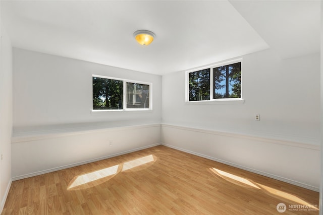 20101 95th Pl NE, Bothell, WA 98011 - empty room with wood finished floors and baseboards