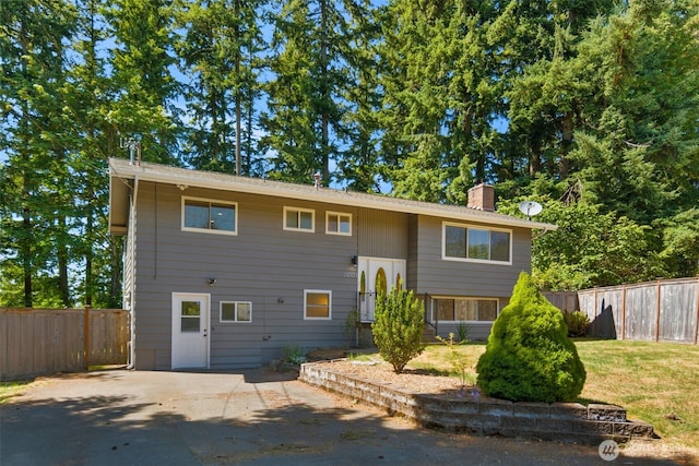 20101 95th Pl NE, Bothell, WA 98011 - view of front of house with a chimney and a patio