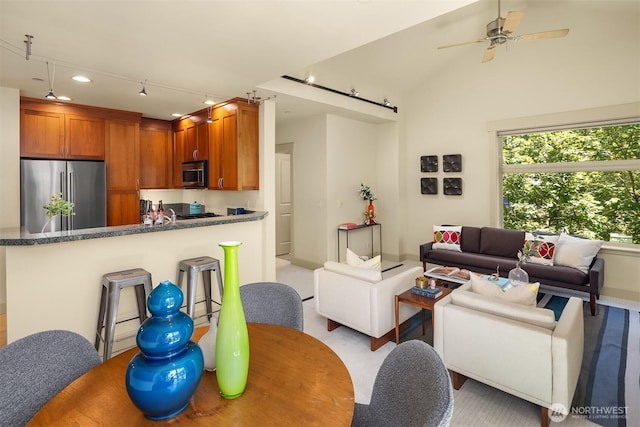 2035 Eastlake Ave E Unit 301, Seattle, WA 98102 - living area with recessed lighting, ceiling fan, and vaulted ceiling