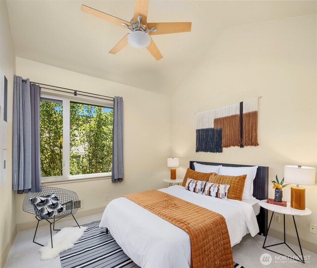 2035 Eastlake Ave E Unit 301, Seattle, WA 98102 - carpeted bedroom featuring lofted ceiling and a ceiling fan