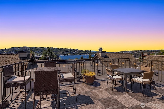 2035 Eastlake Ave E Unit 301, Seattle, WA 98102 - wooden deck featuring outdoor dining area and a water view