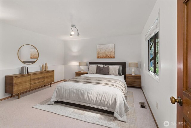 3216 142nd Pl NE, Bellevue, WA 98007 - bedroom featuring light carpet and baseboards