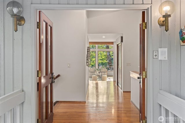 3216 142nd Pl NE, Bellevue, WA 98007 - corridor with light wood-style floors and baseboards