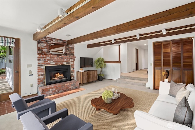 3216 142nd Pl NE, Bellevue, WA 98007 - carpeted living room with a fireplace and beamed ceiling