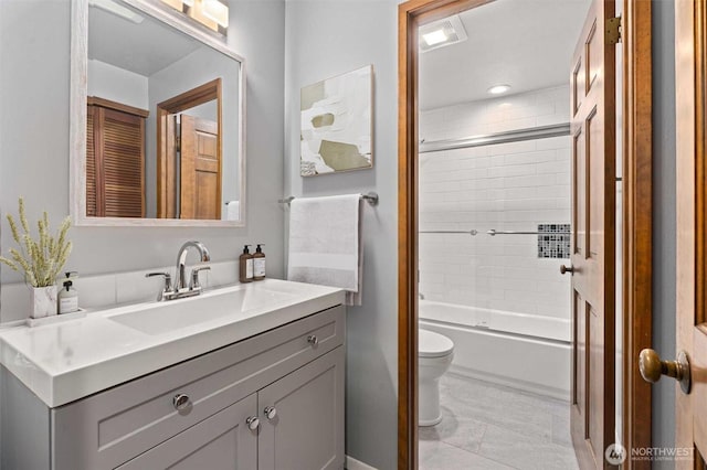 3216 142nd Pl NE, Bellevue, WA 98007 - bathroom featuring vanity, marble finish flooring, and shower / tub combination