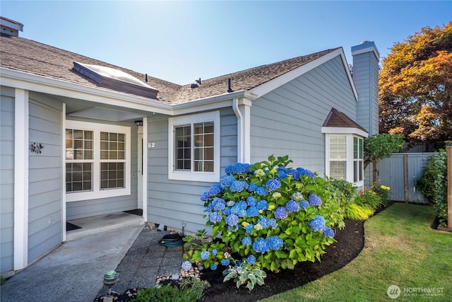 6020 N Highlands Pkwy Unit 52B, Tacoma, WA 98406 - view of side of home featuring a chimney