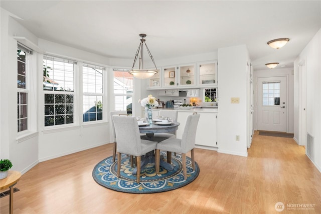 6020 N Highlands Pkwy Unit 52B, Tacoma, WA 98406 - dining space featuring light wood-style floors