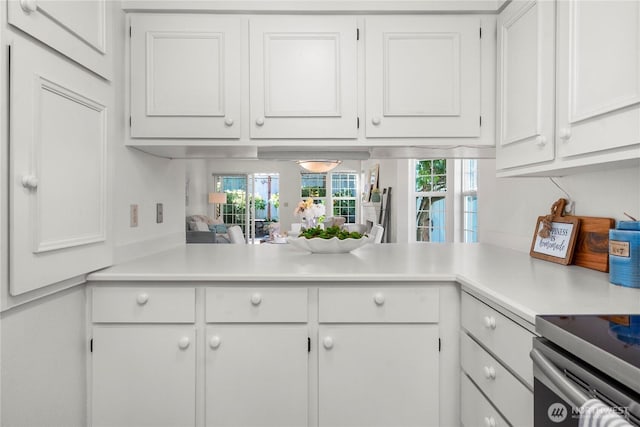 6020 N Highlands Pkwy Unit 52B, Tacoma, WA 98406 - kitchen featuring light countertops and white cabinets