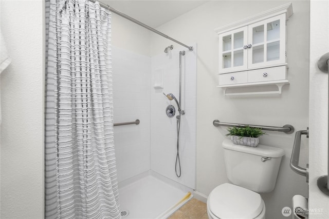 6020 N Highlands Pkwy Unit 52B, Tacoma, WA 98406 - bathroom with a tile shower and tile patterned flooring