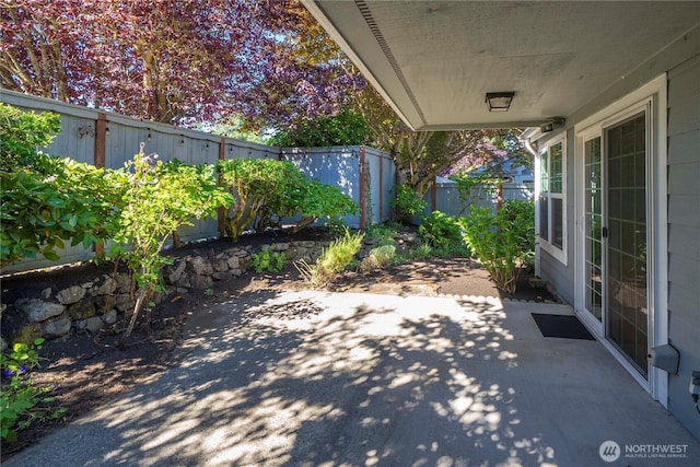 6020 N Highlands Pkwy Unit 52B, Tacoma, WA 98406 - fenced backyard with a patio and a storage shed