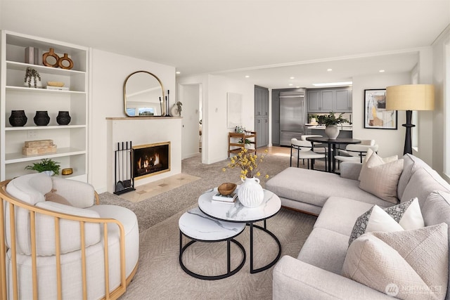 2301 Fairview Ave E Unit 404, Seattle, WA 98102 - living room featuring a fireplace with flush hearth, recessed lighting, and light colored carpet