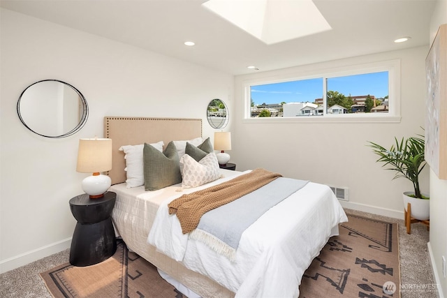2301 Fairview Ave E Unit 404, Seattle, WA 98102 - bedroom featuring carpet floors, a skylight, and recessed lighting