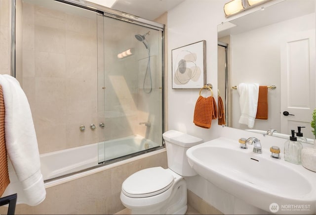 2301 Fairview Ave E Unit 404, Seattle, WA 98102 - full bathroom with tiled shower / bath combo and toilet