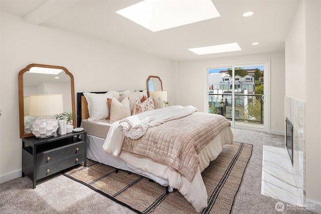 2301 Fairview Ave E Unit 404, Seattle, WA 98102 - carpeted bedroom with a skylight, access to outside, and recessed lighting