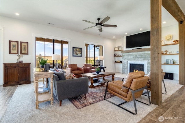 2617 Byrnes Rd, Touchet, WA 99360 - living room with a ceiling fan, a tile fireplace, recessed lighting, and light wood-style floors