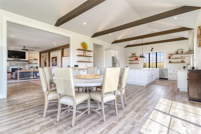 2617 Byrnes Rd, Touchet, WA 99360 - dining area with a ceiling fan, light wood-type flooring, a fireplace, and recessed lighting