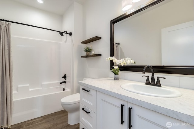 2617 Byrnes Rd, Touchet, WA 99360 - bathroom featuring vanity, shower / tub combo, wood finished floors, and recessed lighting