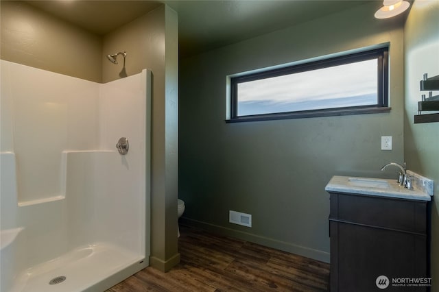 2617 Byrnes Rd, Touchet, WA 99360 - full bath with a shower, wood finished floors, and vanity