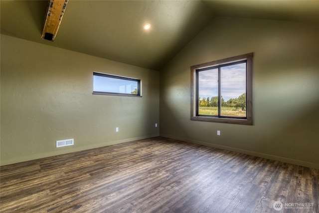 2617 Byrnes Rd, Touchet, WA 99360 - spare room with lofted ceiling and wood finished floors
