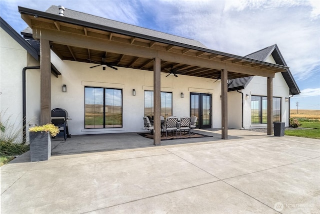 2617 Byrnes Rd, Touchet, WA 99360 - rear view of house with a ceiling fan, a patio, stucco siding, and french doors