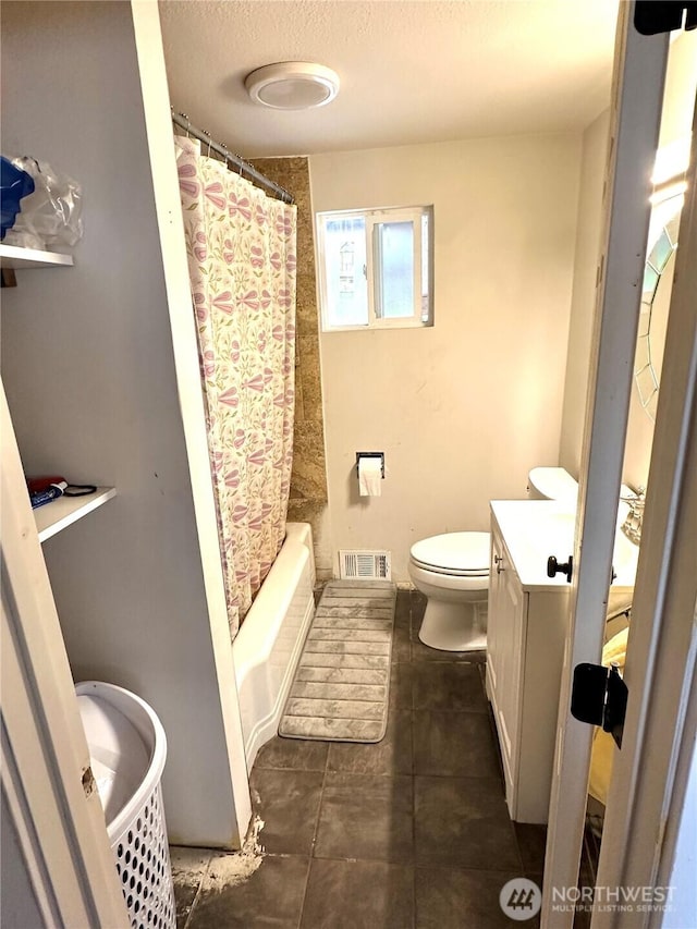 10204 19th Ave SW, Seattle, WA 98146 - bathroom with vanity, a textured ceiling, shower / bath combo, and tile patterned floors