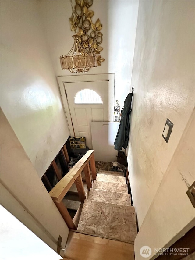 10204 19th Ave SW, Seattle, WA 98146 - stairs featuring a chandelier