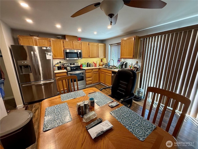 1700 Lincoln Park Cir, Wenatchee, WA 98801 - kitchen featuring appliances with stainless steel finishes, a ceiling fan, light countertops, recessed lighting, and light wood-type flooring