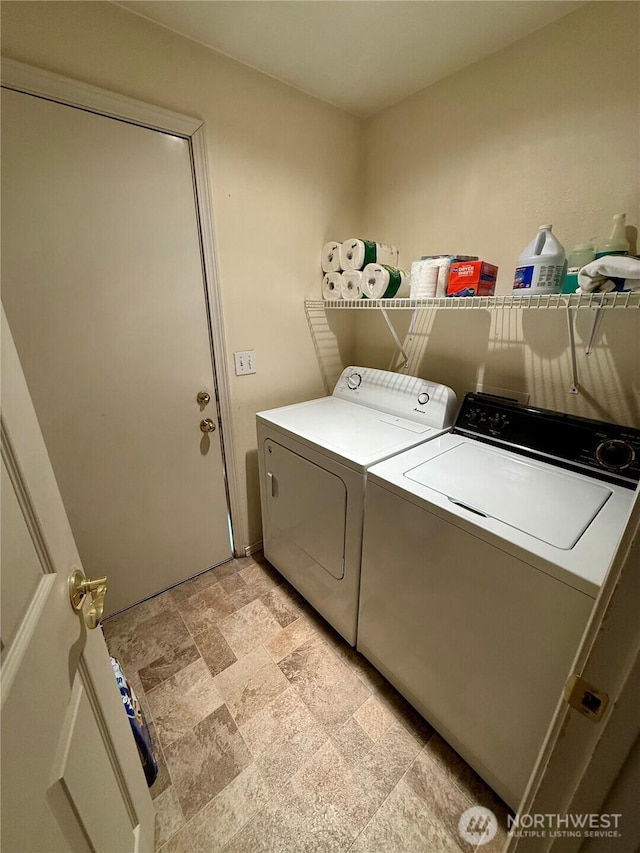 1700 Lincoln Park Cir, Wenatchee, WA 98801 - laundry area with separate washer and dryer and stone finish floors