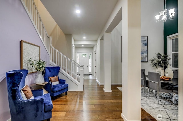 5708 197th Pl SE, Bothell, WA 98012 - foyer entrance featuring wood finished floors, stairs, recessed lighting, and a chandelier