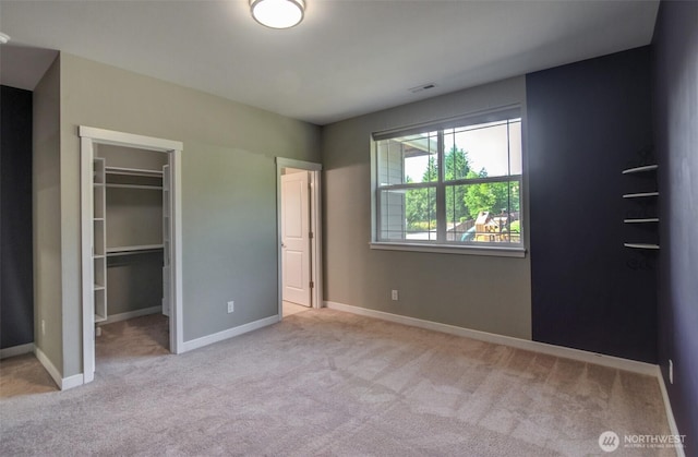 5708 197th Pl SE, Bothell, WA 98012 - unfurnished bedroom featuring carpet floors, a walk in closet, and a closet