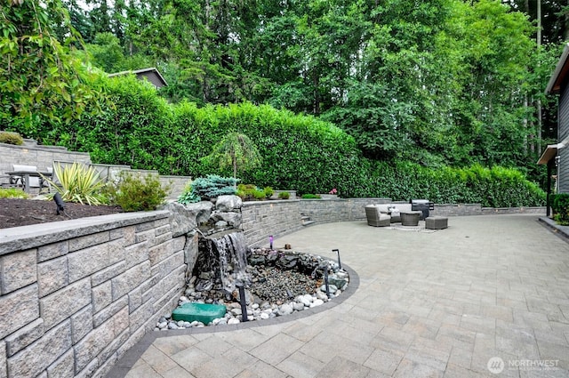 5708 197th Pl SE, Bothell, WA 98012 - view of patio / terrace with an outdoor living space
