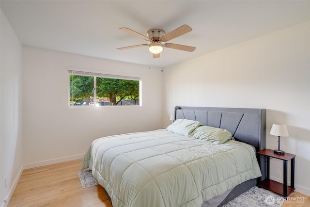 1279 149th Pl SE, Bellevue, WA 98007 - bedroom with wood finished floors and ceiling fan