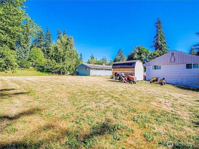 4803 84th St SW, Mukilteo, WA 98275 - view of grassy yard featuring a shed