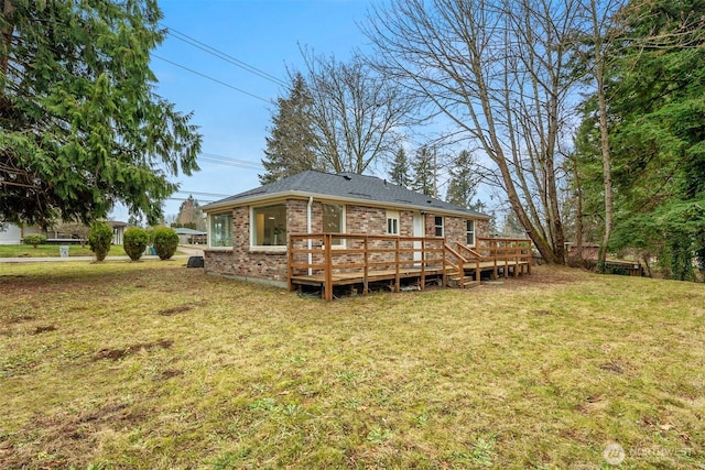 18006 116th Ave SE, Renton, WA 98058 - rear view of house with a yard, brick siding, a wooden deck, and roof with shingles