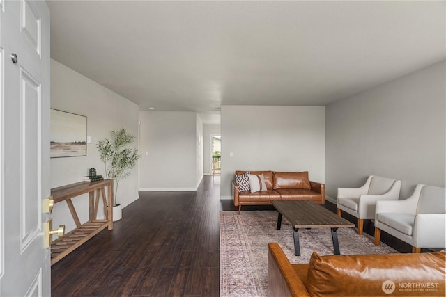 1608 W Market St, Aberdeen, WA 98520 - living area featuring dark wood-style floors and baseboards