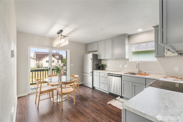1608 W Market St, Aberdeen, WA 98520 - kitchen with stainless steel appliances, gray cabinetry, dark wood-style floors, plenty of natural light, and recessed lighting