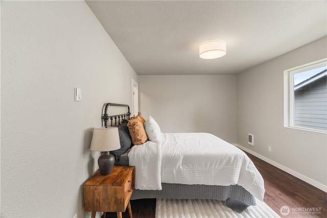 1608 W Market St, Aberdeen, WA 98520 - bedroom with baseboards and wood finished floors